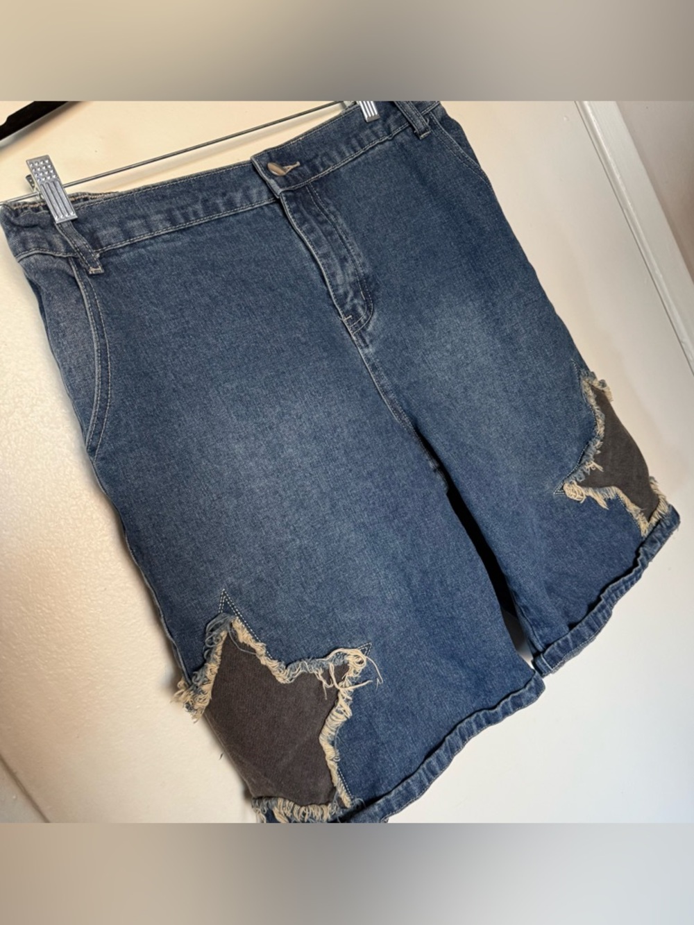 Oversized bermuda shorts with star cutout details